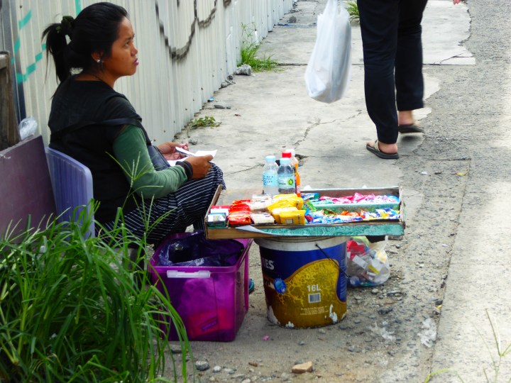 Kvinnelig gateselger